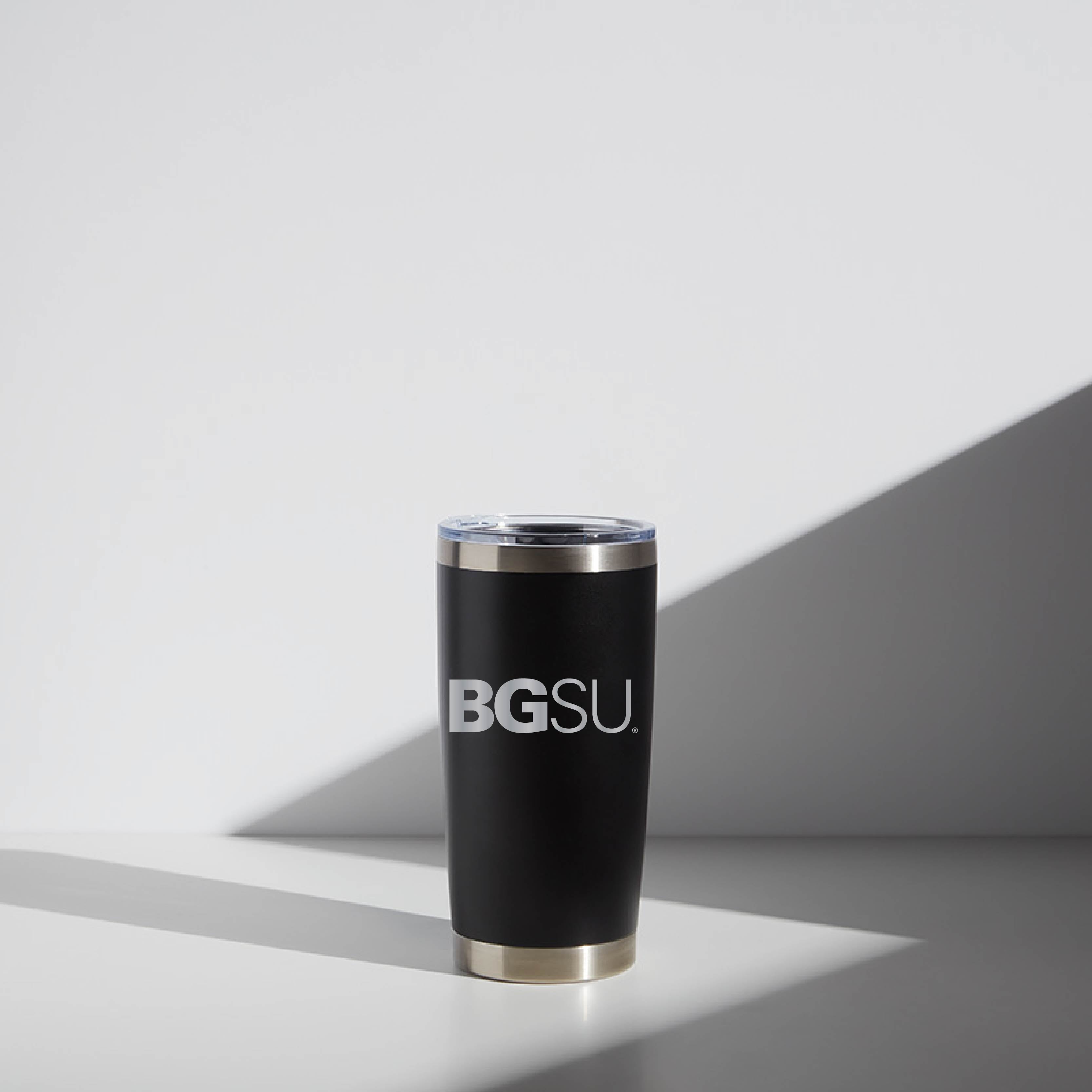 20 oz black WATR tumbler with BGSU logo, featuring a clear lid and gold base, set against a white background with a subtle shadow.