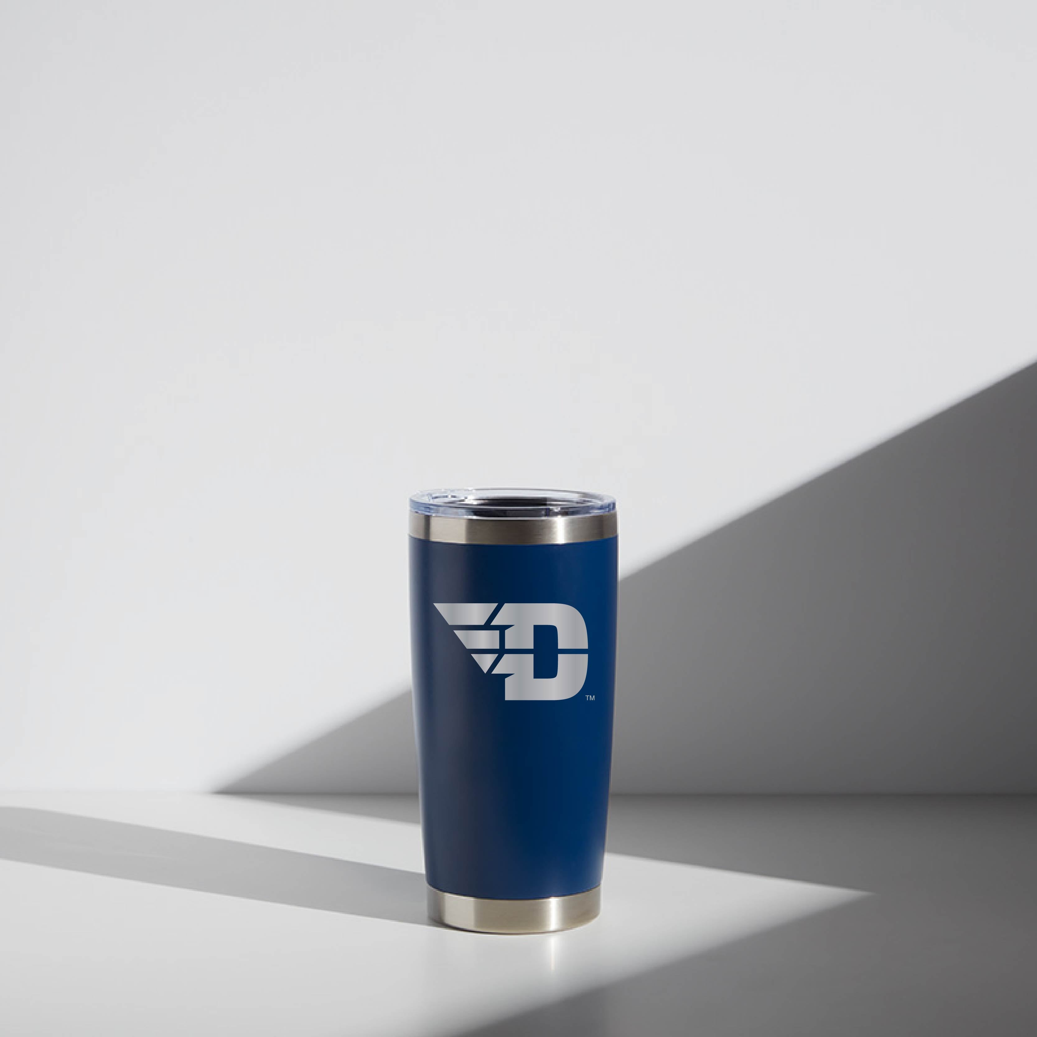 Blue 20 oz WATR Tumbler featuring the Dayton "Flying D" logo, displayed on a light background with subtle shadows.