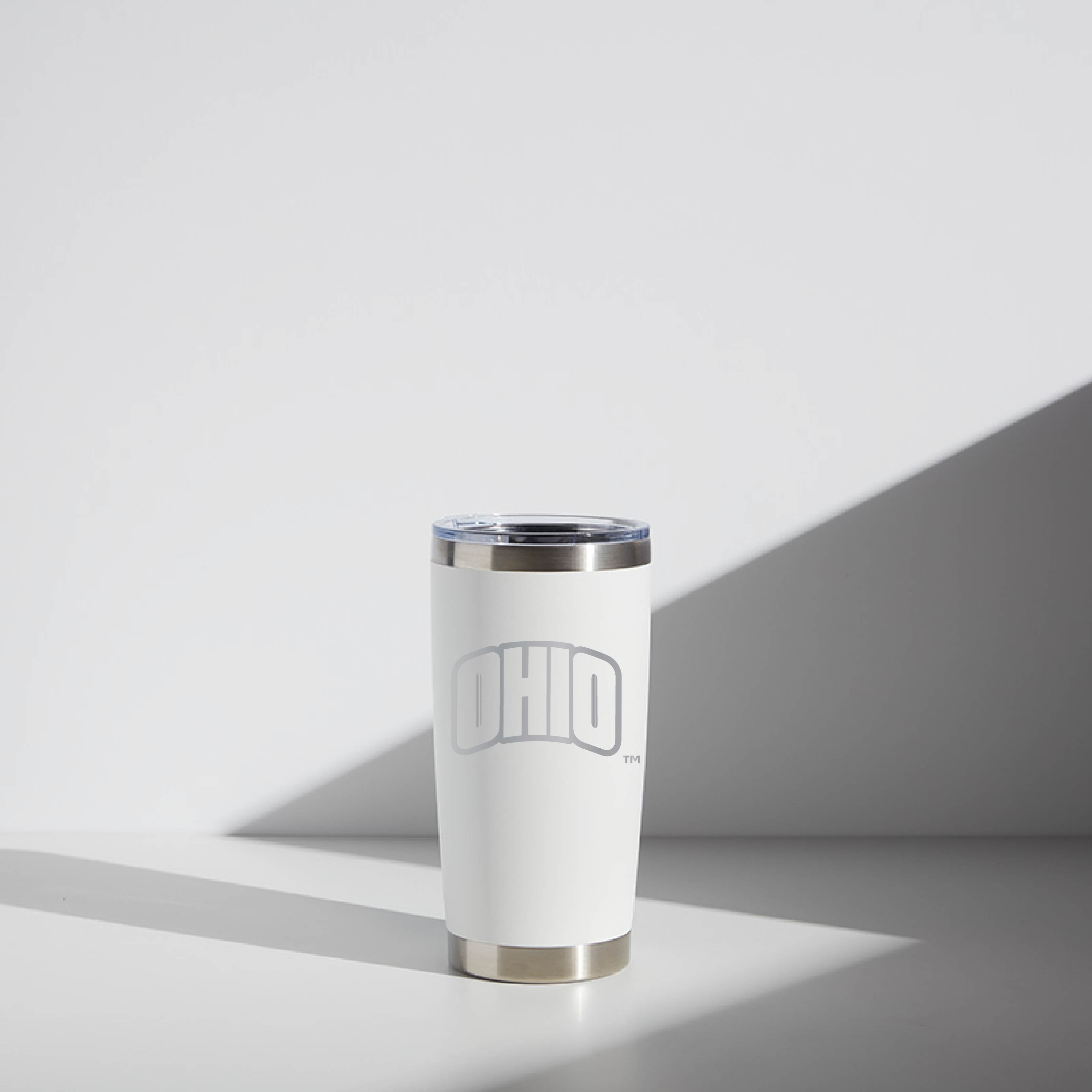 White 20 oz WATR Tumbler with Ohio state outline and logo, stainless steel rim, on a shaded background.