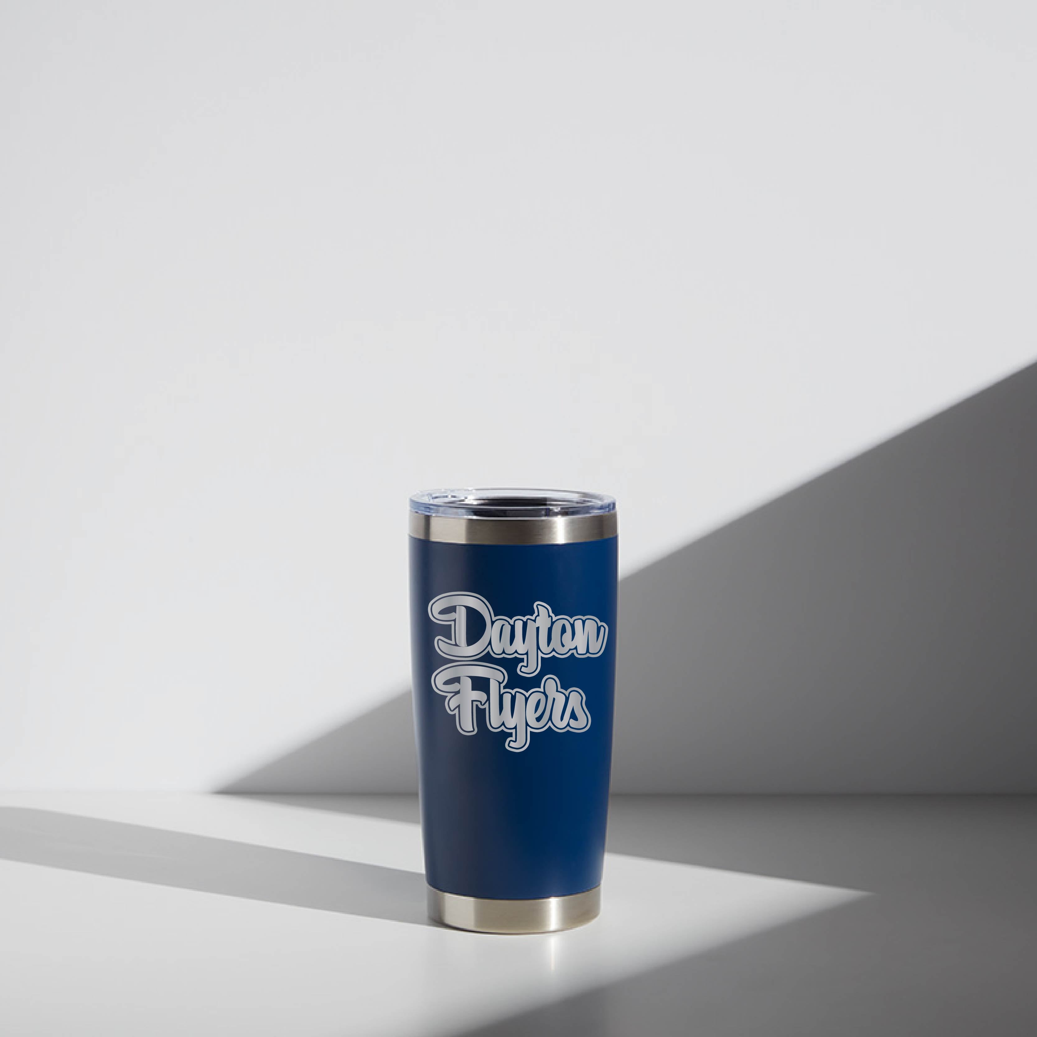 Alt text: "20 oz WATR Tumbler in blue with silver accents, featuring the Dayton Flyers logo in white script, set against a light gray background with shadow detailing."