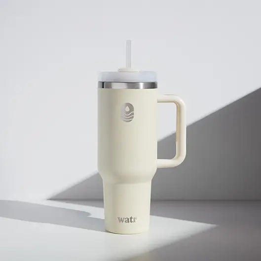 Custom cream-colored Watr insulated water bottle with handle and straw lid, engraved with a water drop logo, for country clubs