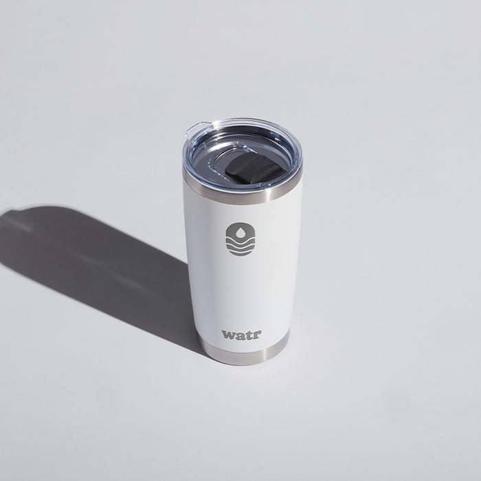 White 20 oz WATR branded insulated tumbler with a clear lid, featuring the Manta United Soccer logo on a light background.